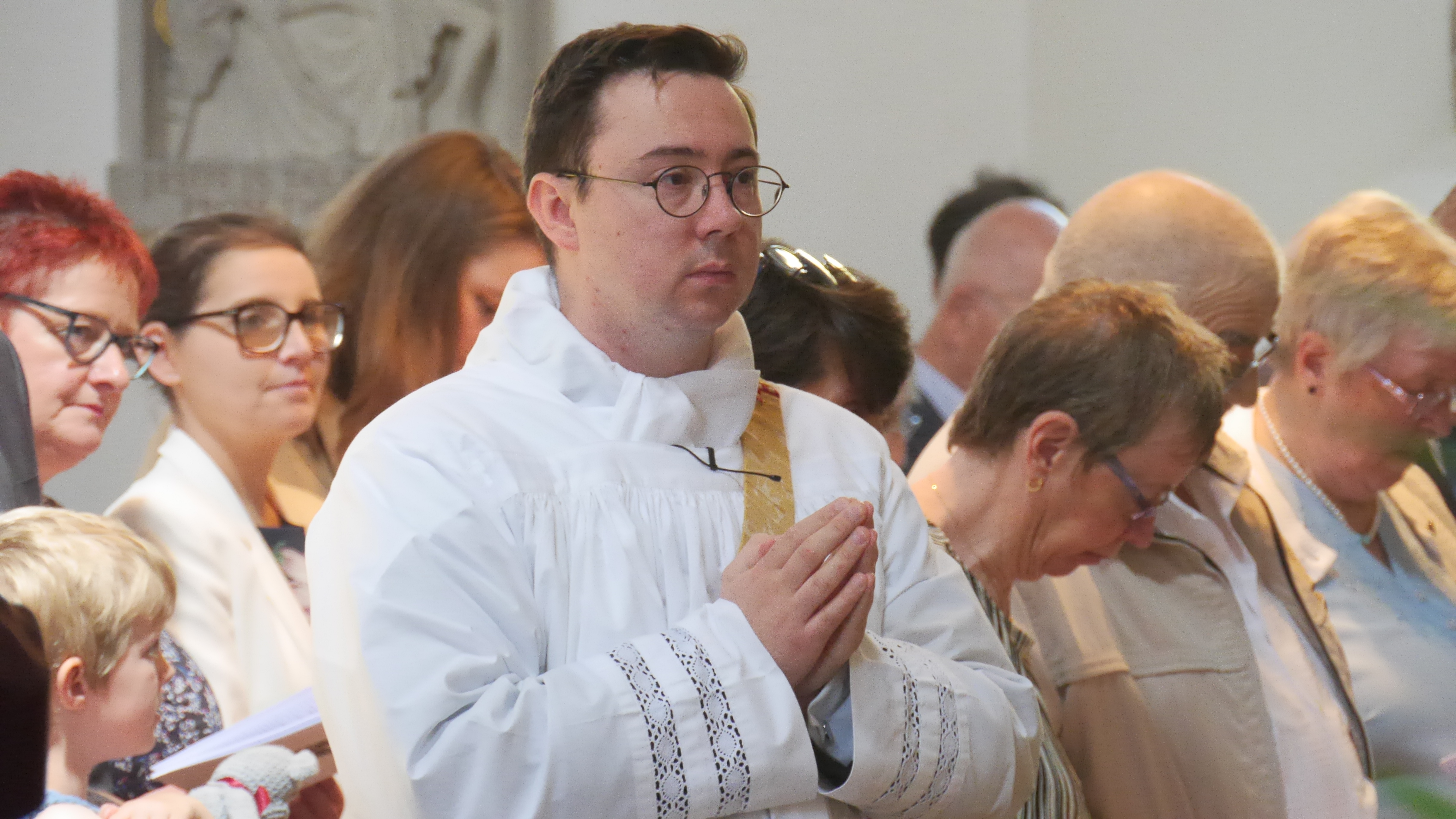 Deacon James joins his mother, other family and friends in the pews of Plymouth Cathedral